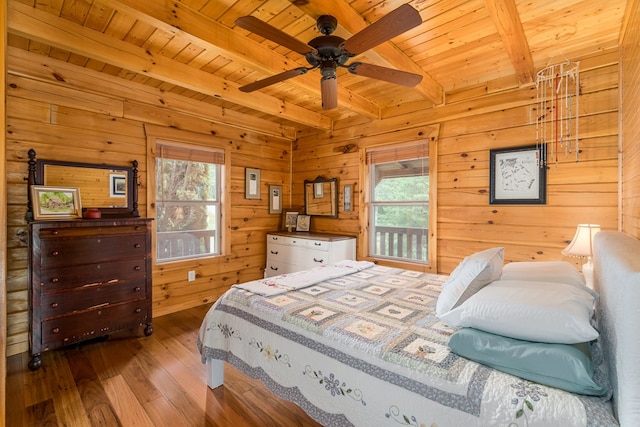 bedroom with multiple windows, wood-type flooring, and wood ceiling