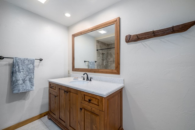 bathroom with vanity and tile patterned floors