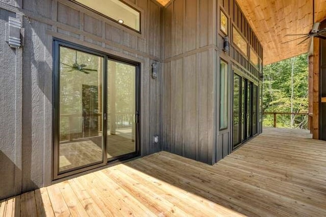 wooden deck with ceiling fan