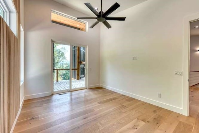 unfurnished room featuring light hardwood / wood-style flooring and ceiling fan