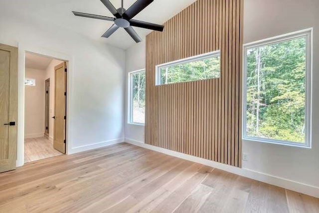 spare room featuring ceiling fan and light wood-type flooring