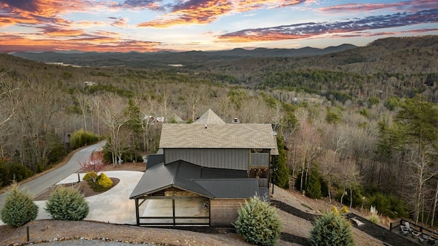 aerial view at dusk with a mountain view