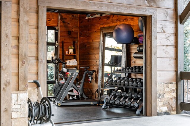 interior space with wood walls and a wealth of natural light