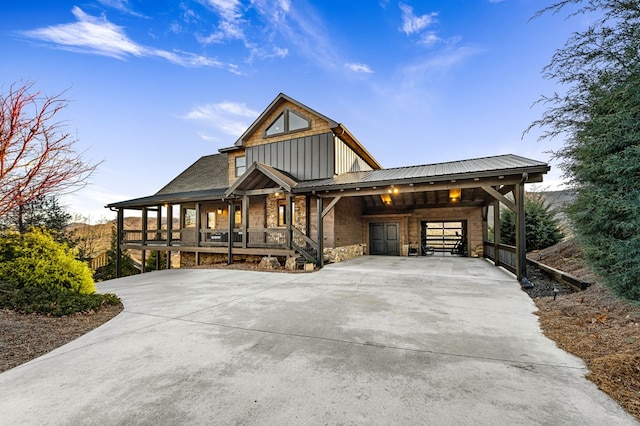 view of front facade with a porch and a carport