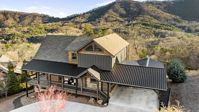 exterior space featuring a mountain view