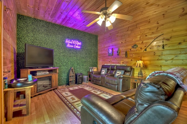 living room featuring wooden ceiling, ceiling fan, and wood finished floors