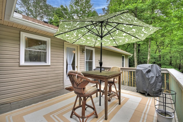 27 Ivy St, Ellijay, GA 30540 - wooden deck with area for grilling and outdoor dining area