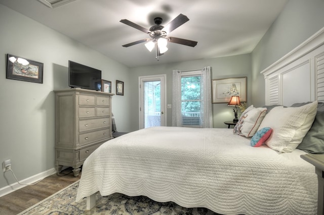27 Ivy St, Ellijay, GA 30540 - bedroom with access to outside, dark wood finished floors, baseboards, and ceiling fan