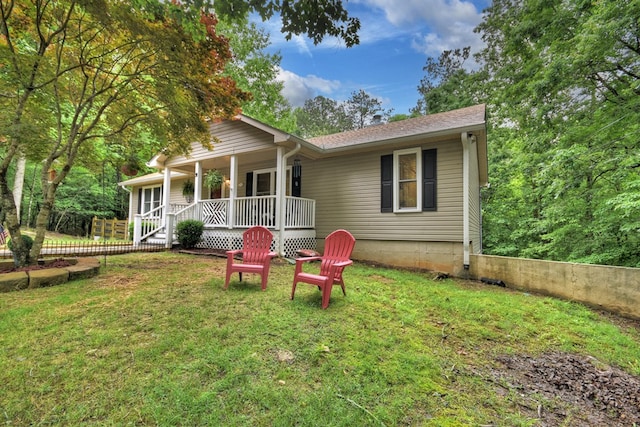 27 Ivy St, Ellijay, GA 30540 - view of front facade with covered porch and a front yard