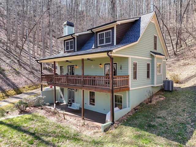 526 Garland Ridge Dr, Hayesville, NC 28904 - view of front of home featuring a front yard, a patio area, a chimney, cooling unit, and ceiling fan