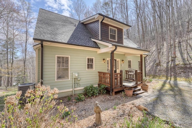 526 Garland Ridge Dr, Hayesville, NC 28904 - view of front of property with a shingled roof, central AC, and a porch