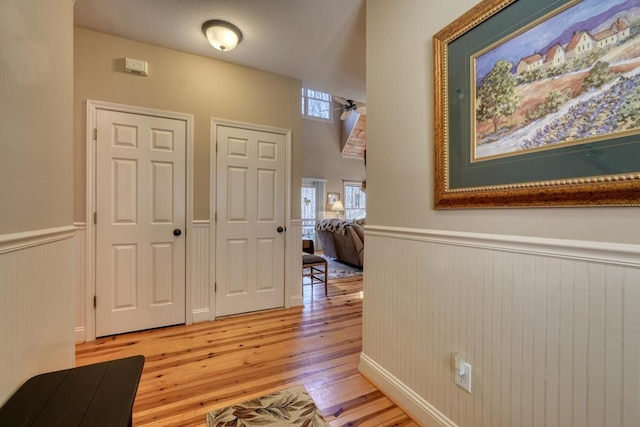 526 Garland Ridge Dr, Hayesville, NC 28904 - interior space with a wainscoted wall and light wood-type flooring