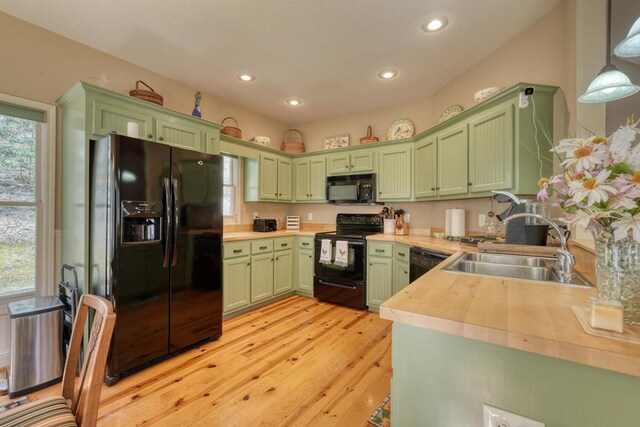526 Garland Ridge Dr, Hayesville, NC 28904 - kitchen with a sink, light wood finished floors, green cabinets, black appliances, and recessed lighting