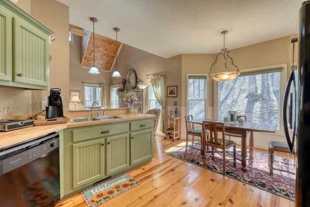 526 Garland Ridge Dr, Hayesville, NC 28904 - kitchen with green cabinets, fridge, a sink, dishwasher, and light wood-style flooring