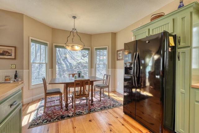 526 Garland Ridge Dr, Hayesville, NC 28904 - dining room with a wainscoted wall and light wood finished floors