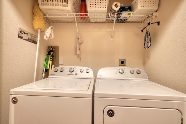 526 Garland Ridge Dr, Hayesville, NC 28904 - laundry room with laundry area, a textured wall, and separate washer and dryer