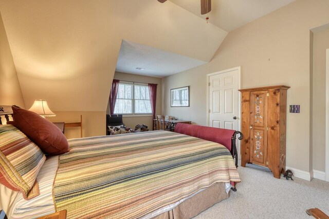526 Garland Ridge Dr, Hayesville, NC 28904 - carpeted bedroom with baseboards, lofted ceiling, and a ceiling fan