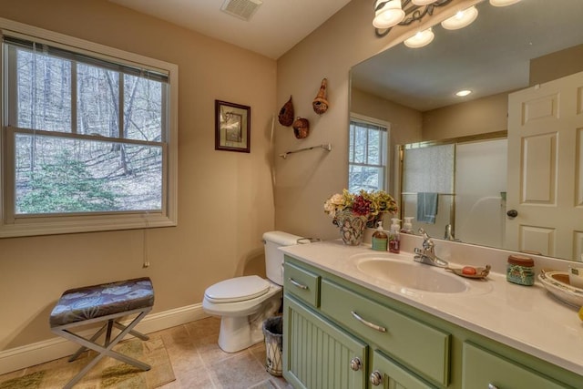 526 Garland Ridge Dr, Hayesville, NC 28904 - full bathroom featuring toilet, vanity, a shower stall, baseboards, and visible vents