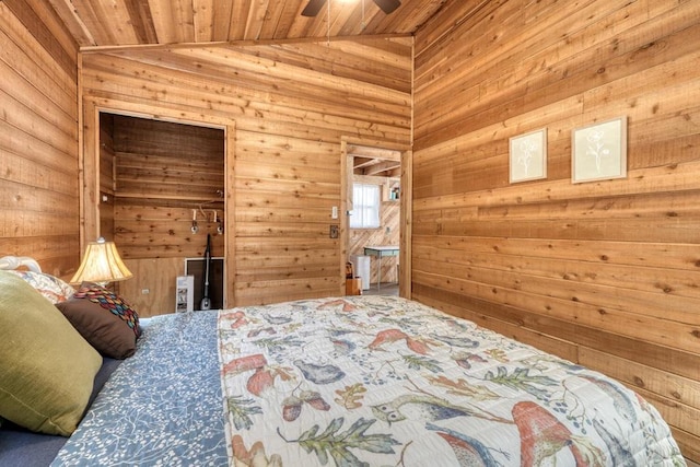 526 Garland Ridge Dr, Hayesville, NC 28904 - bedroom with vaulted ceiling, ceiling fan, wood ceiling, and wood walls
