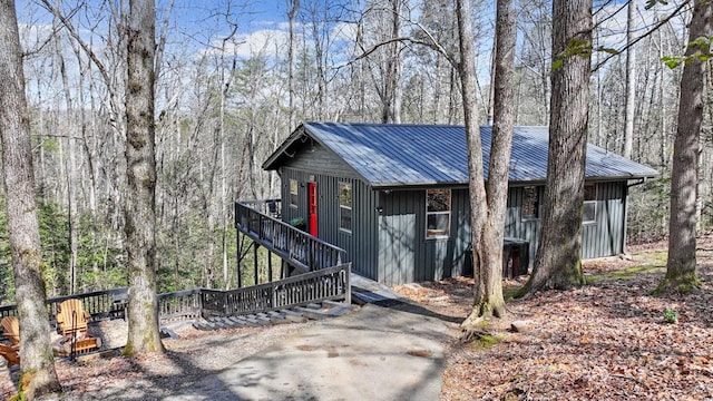 222 Icy Ln, Blue Ridge, GA 30513 - view of front of property with metal roof and board and batten siding
