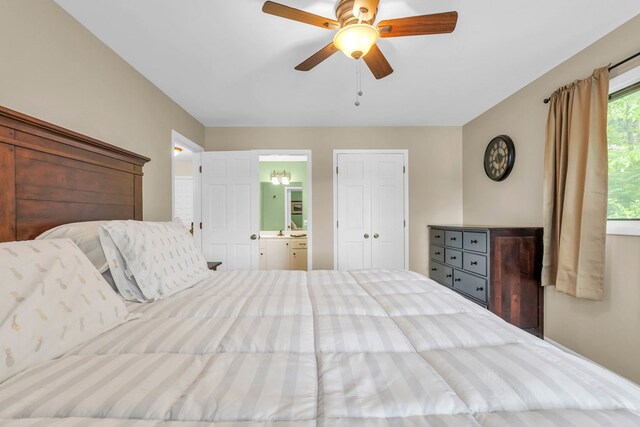 bedroom featuring connected bathroom and a ceiling fan