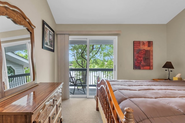 bedroom featuring access to outside and light colored carpet