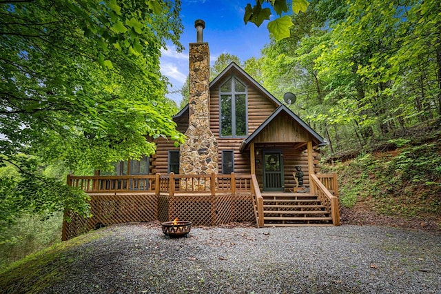 35 The Blf, Morganton, GA 30560 - rear view of property with log siding, a fire pit, a chimney, and a wooden deck