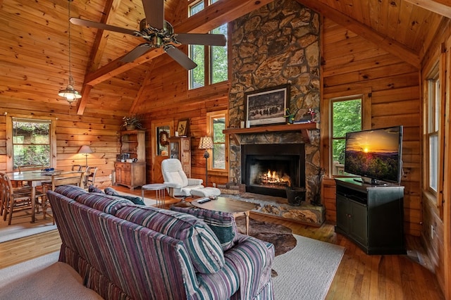 35 The Blf, Morganton, GA 30560 - living room with high vaulted ceiling, a ceiling fan, hardwood / wood-style flooring, wooden walls, and beam ceiling