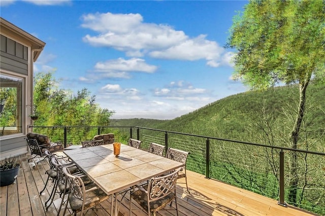 deck with outdoor dining space