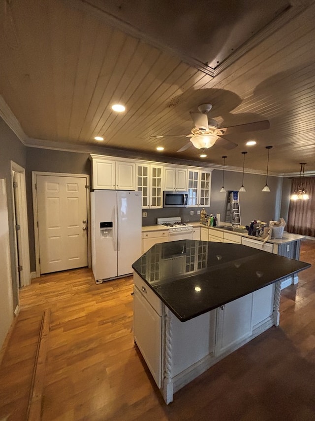 kitchen with white cabinetry, white appliances, crown molding, and wooden ceiling