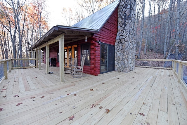 wooden terrace with grilling area