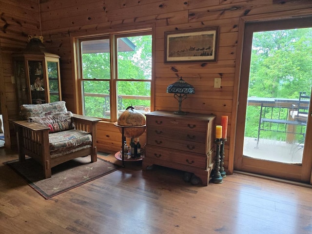 1102 Summit Way, Blairsville, GA 30512 - living area with wooden walls, wood finished floors, and healthy amount of natural light
