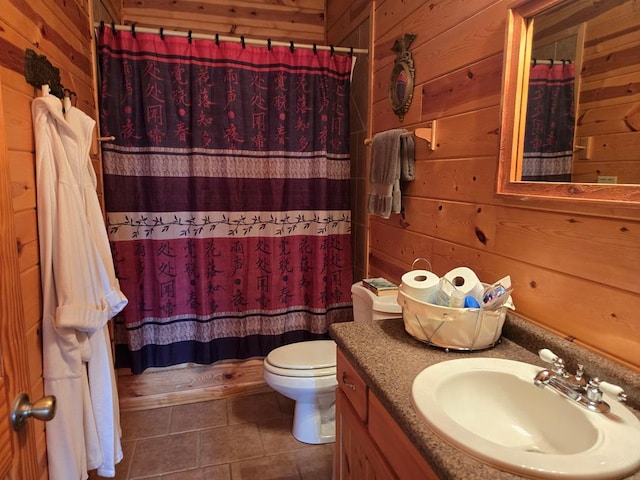 1102 Summit Way, Blairsville, GA 30512 - full bathroom featuring wood walls, tile patterned flooring, vanity, toilet, and a shower with shower curtain
