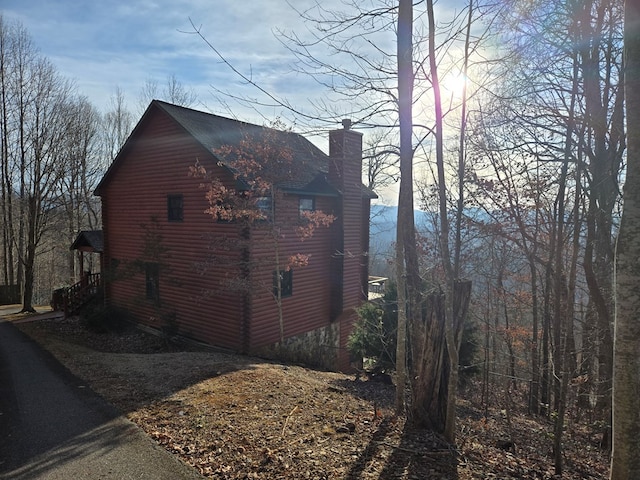 1102 Summit Way, Blairsville, GA 30512 - view of home's exterior with a chimney