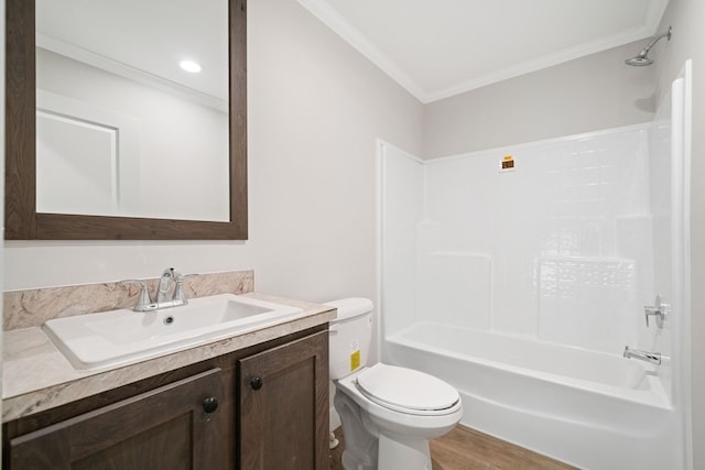 full bathroom with vanity, ornamental molding, tub / shower combination, wood finished floors, and toilet