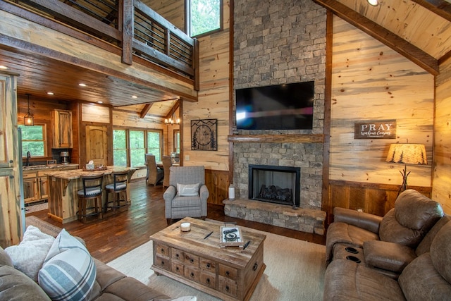 340 Hooch Holler Ln, Morganton, GA 30560 - living area featuring wood walls, high vaulted ceiling, dark wood-type flooring, a fireplace, and recessed lighting