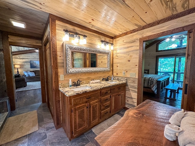 340 Hooch Holler Ln, Morganton, GA 30560 - ensuite bathroom featuring wooden walls, wooden ceiling, double vanity, and stone finish floors
