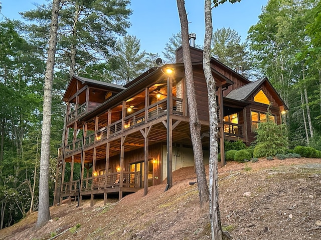 340 Hooch Holler Ln, Morganton, GA 30560 - back of property featuring a chimney and a wooden deck