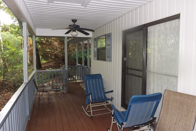 wooden deck with ceiling fan