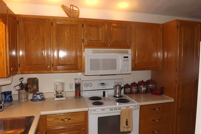 kitchen featuring white appliances