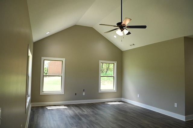 spare room with high vaulted ceiling, dark hardwood / wood-style flooring, and ceiling fan