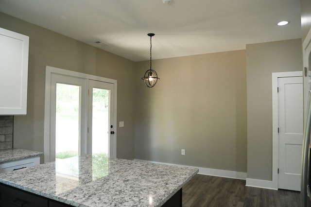 interior space with dark hardwood / wood-style floors