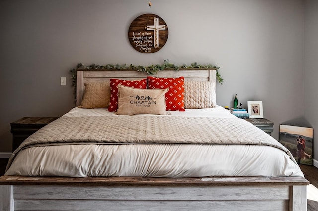 bedroom featuring hardwood / wood-style flooring