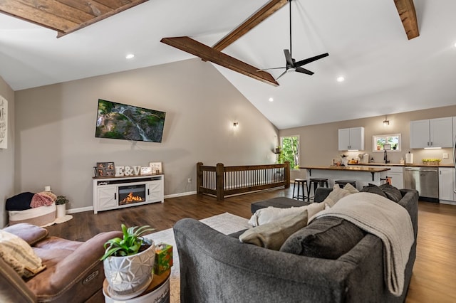 living room with beamed ceiling, ceiling fan, high vaulted ceiling, and dark wood-type flooring