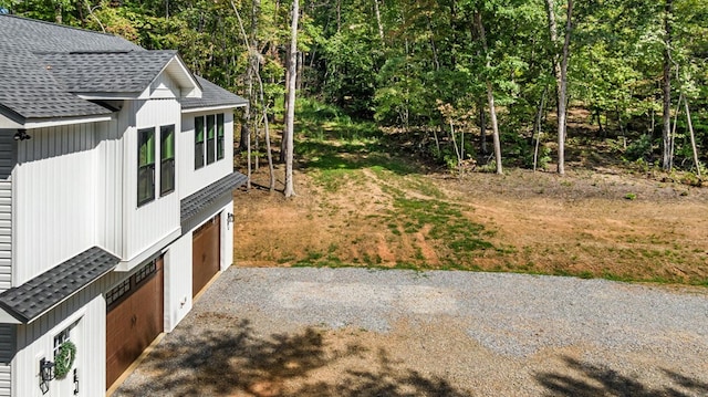 view of yard with a garage