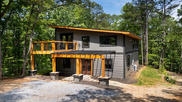 43 Old Federal Rd, Talking Rock, GA 30175 - view of front of home featuring french doors, a balcony, a standing seam roof, metal roof, and board and batten siding