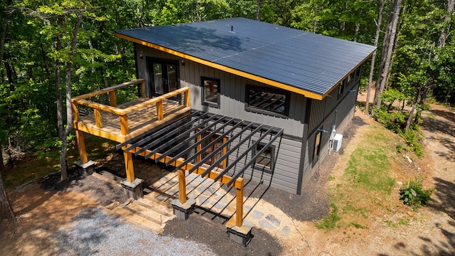 43 Old Federal Rd, Talking Rock, GA 30175 - view of front facade featuring metal roof, a wooden deck, and stairs