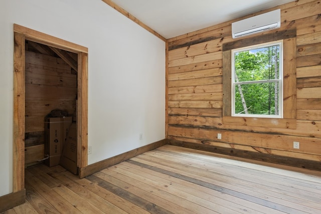 43 Old Federal Rd, Talking Rock, GA 30175 - spare room featuring a wall unit AC, wood-type flooring, and wood walls