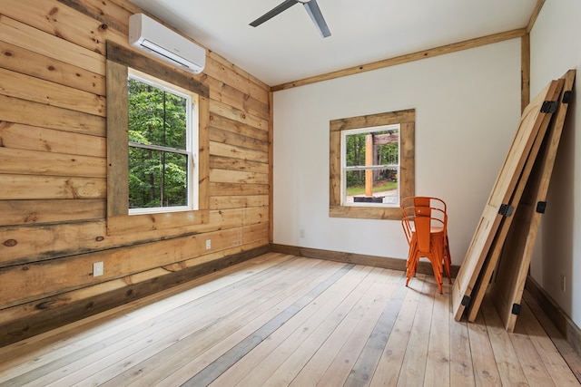 43 Old Federal Rd, Talking Rock, GA 30175 - unfurnished room with a wall mounted air conditioner, healthy amount of natural light, ceiling fan, baseboards, and wood walls