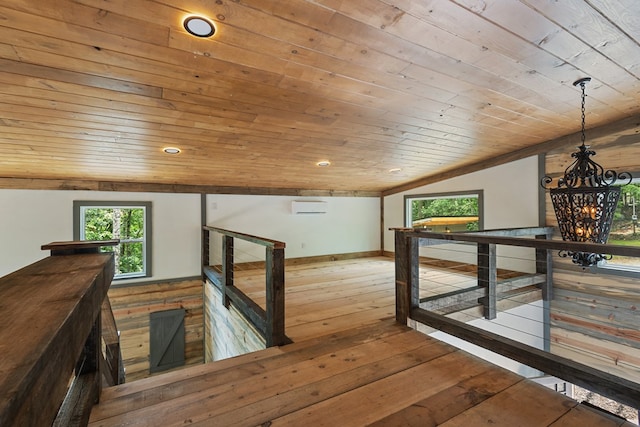 43 Old Federal Rd, Talking Rock, GA 30175 - hall with wooden ceiling, wood-type flooring, a wall mounted AC, lofted ceiling, and an upstairs landing